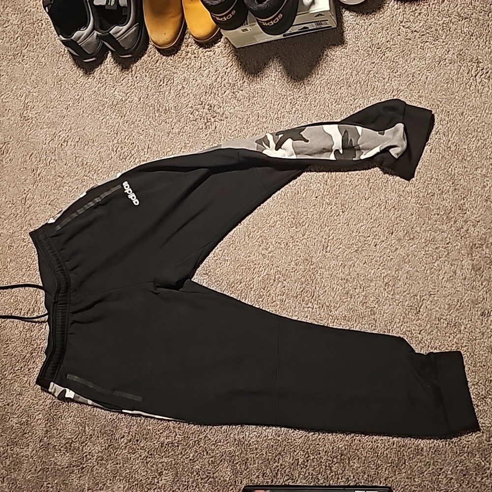 Black joggers with the side camo stripe